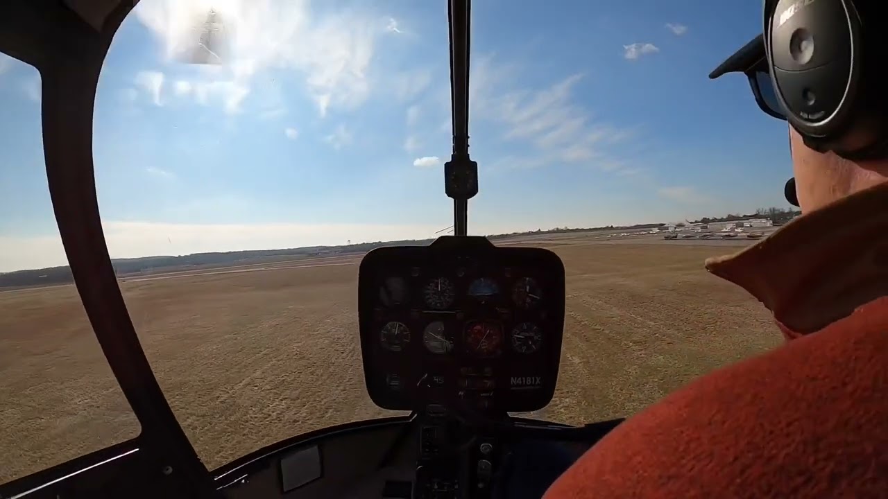 Solo practice in the Robinson R44 helicopter with winds 13 gusting to 19