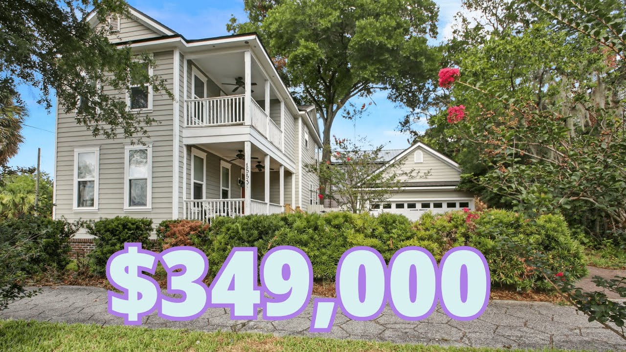 Come See inside This Attractive and AFFORDABLE $349,000 Three Bedroom Home With Detached Garage!