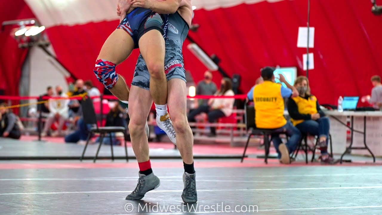 145 – Riley Woods of Batavia IL defeated Justin VanVaerenbergh of Hartland MI by Decision 7–6