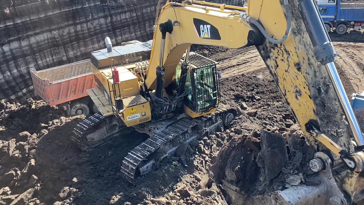 Caterpillar 374D Excavator Loading Massive Mercedes & MAN Trucks - Interkat SA