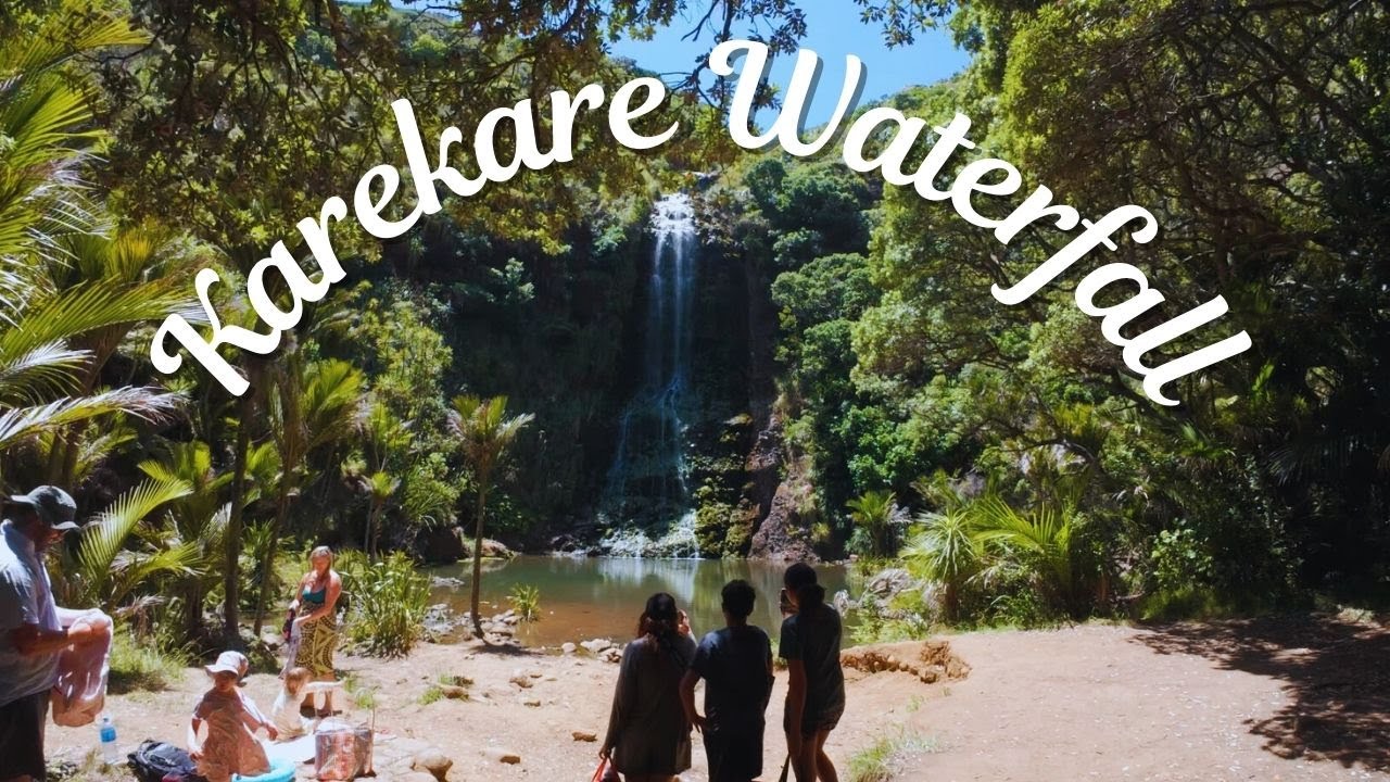 Swimming at Karekare Waterfall in the Waitakere Ranges, West Auckland.
