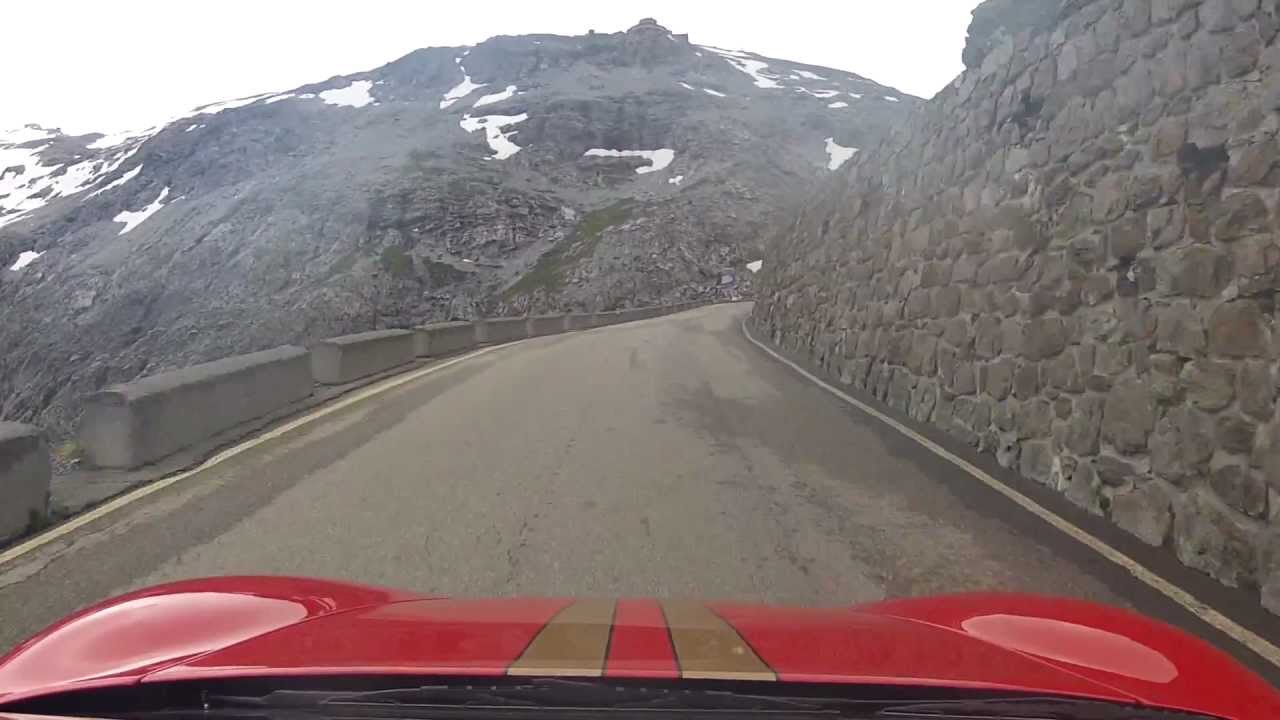 Ferrari 430 Scuderia driving up the Stelvio Pass / Stilfser Joch