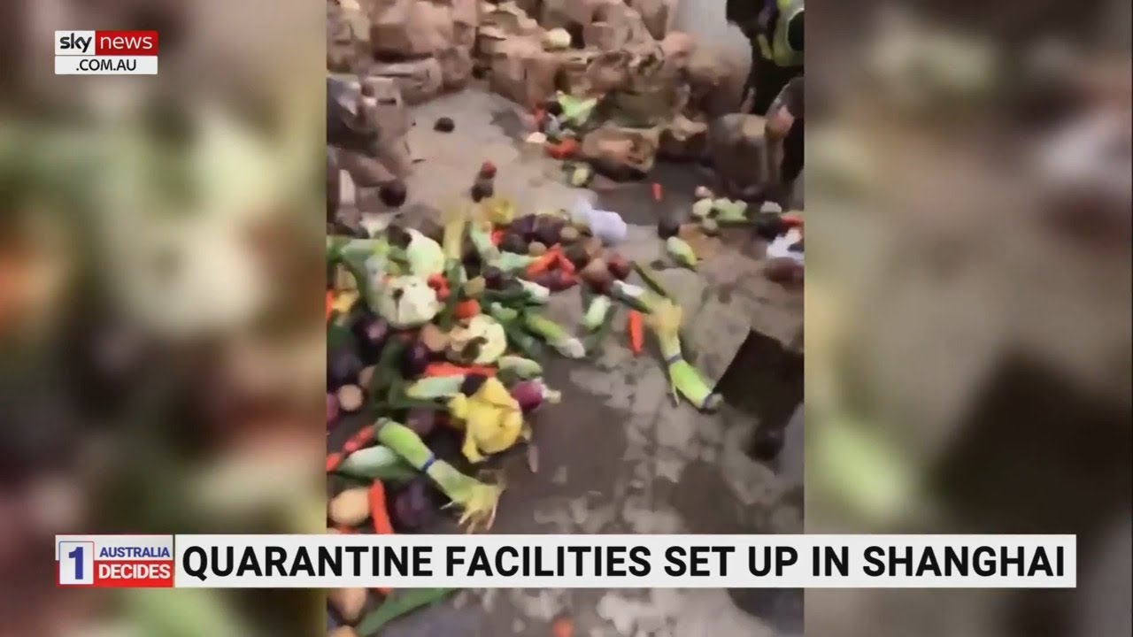 Social media videos show officials dumping food in locked-down Shanghai