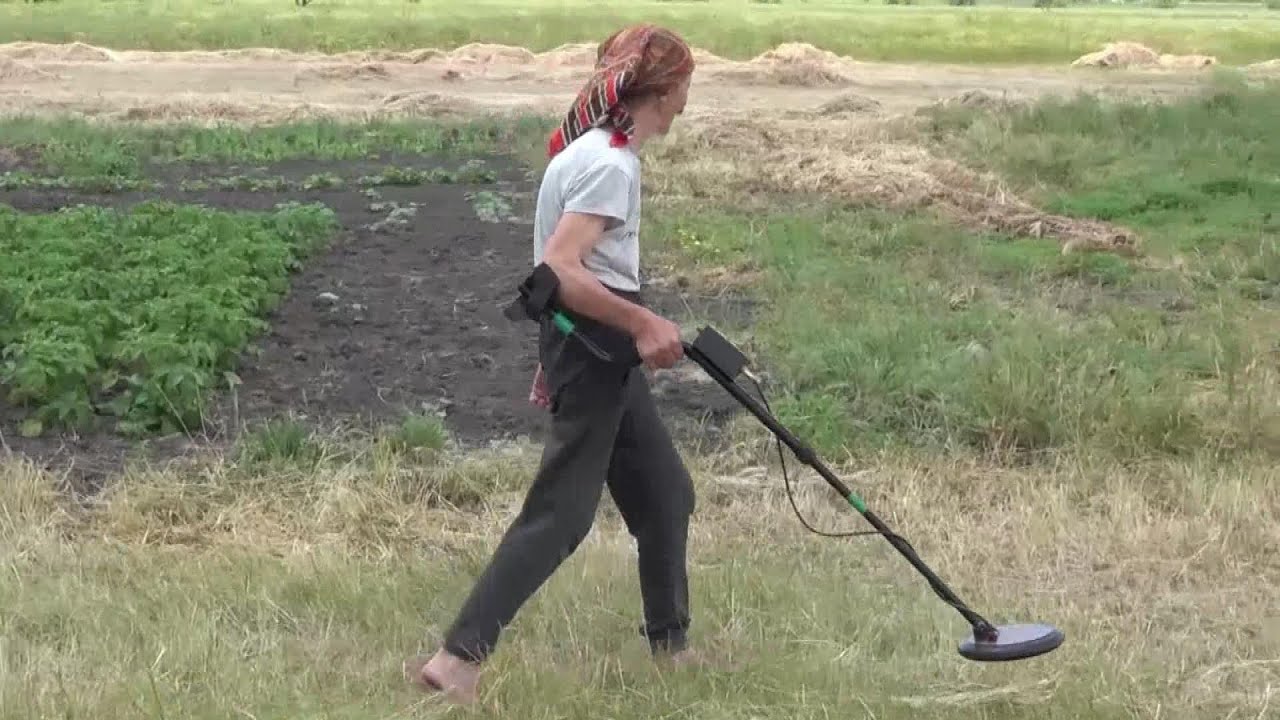 Farmer Scans for Landmines on Farm in Ukraine