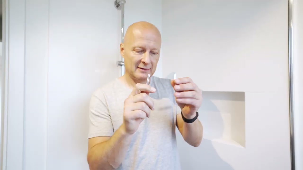 Montering af brusevæg