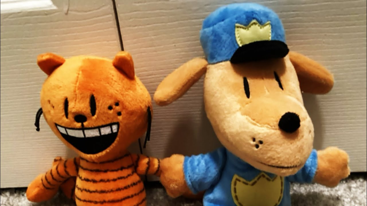 Me unboxing dog man and Petey plush ￼