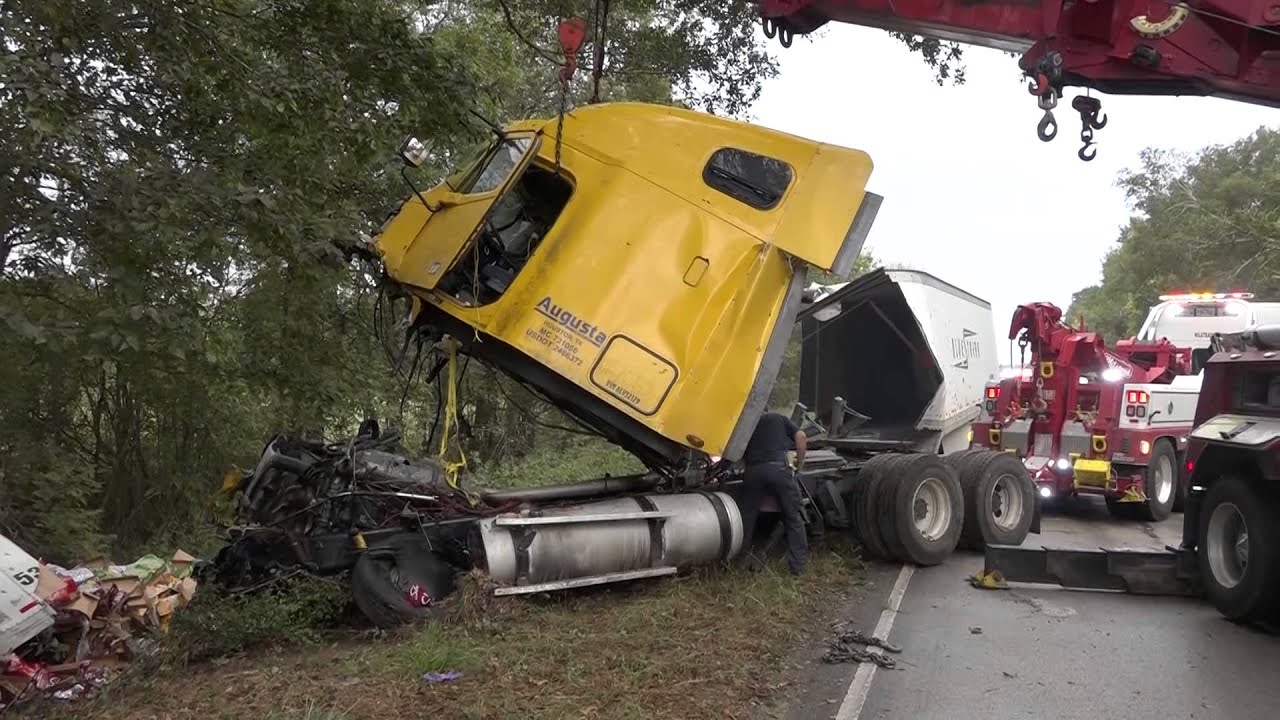 102315 18 WHEELER LOADED WITH SHASTA SOFT DRINKS ROLLS OVER IN WILLIS