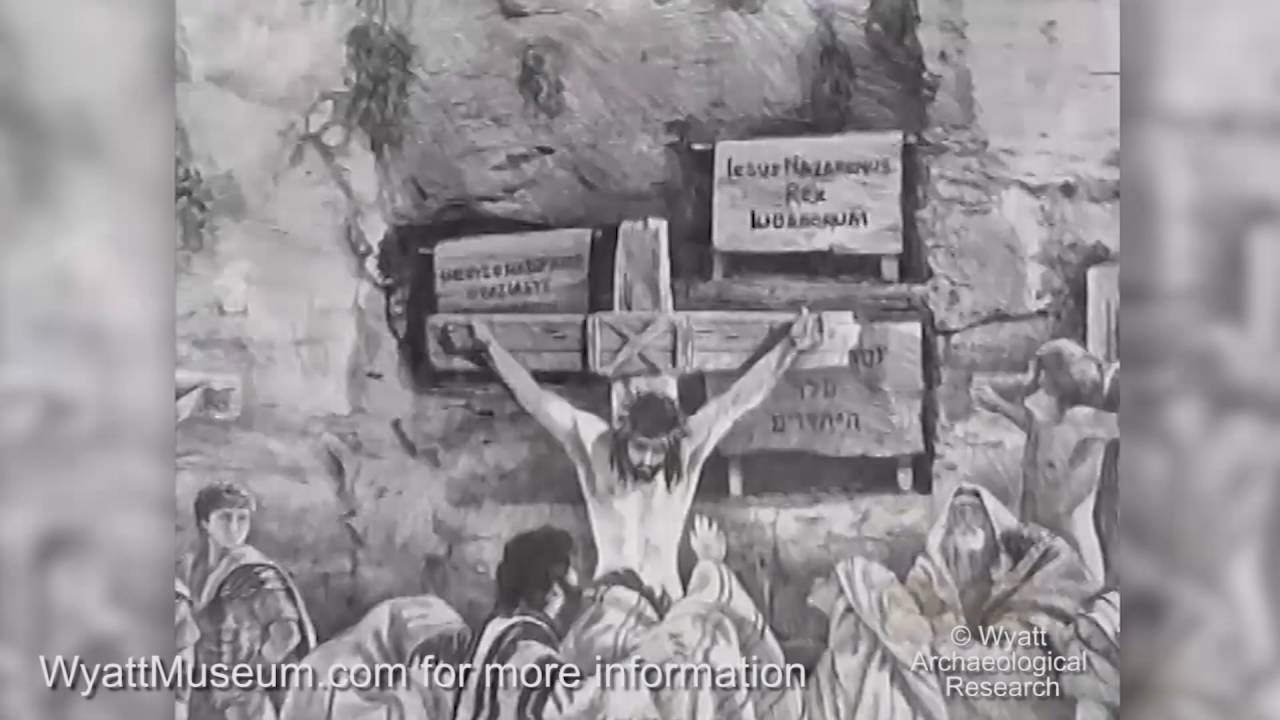 Stone sepulchre and cliff face of 