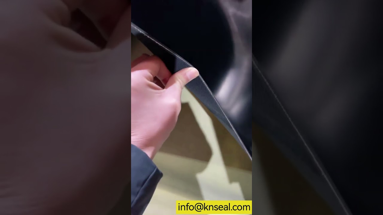 Fabric reinforced natural rubber sheets