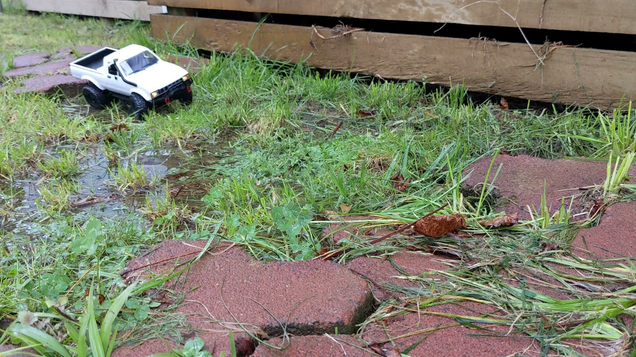 New WPL C24 Waterproof crawling in a puddle