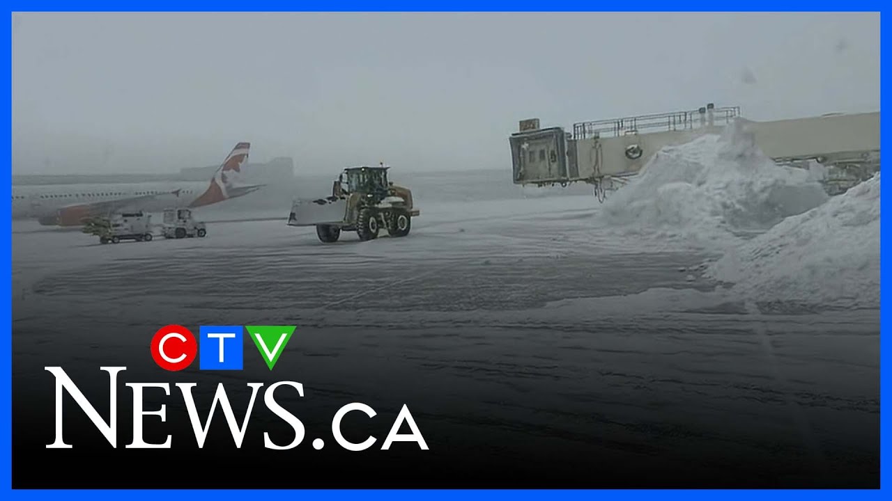 Major travel disruptions at Toronto Pearson airport as winter storm dumps up to 50 cm of snow