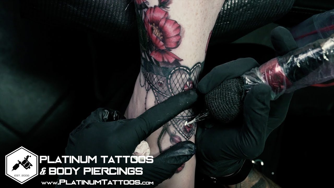 Bold Lace Ankle Tattoo &ndash; Elegance with an Edge 🖤  at Platinum Tattoos