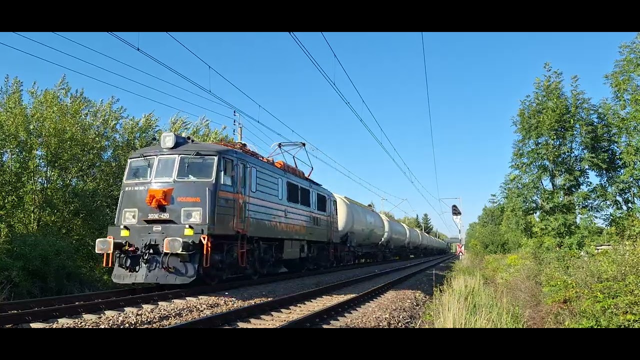 303E-420 [Pol-Trans sp. z o.o] z cysternami +SM42-1107 [SKPL Cargo Sp. z.o.o]