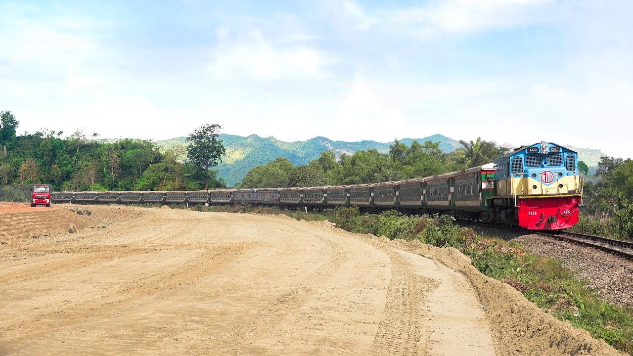 Mohanagar Provati Express Train skipping small Hilly area in Background at Mondabagh, Kasba, Akhaura