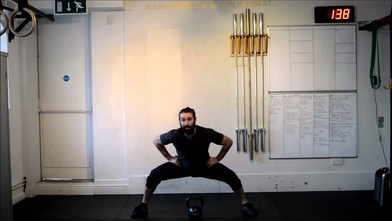 Weighted Horse Stance Squats