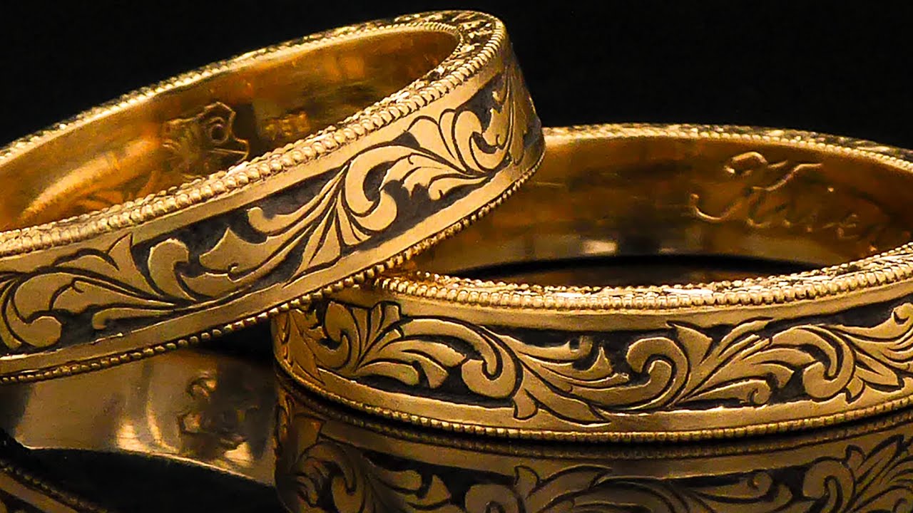 Sand cast wedding rings. Handcrafted and engraved in 750 rose gold