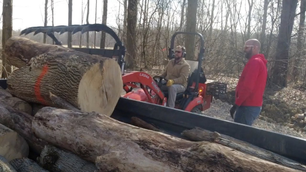 Kubota BX, грейфер, Stihl MS500i и бесконечный запас древесины