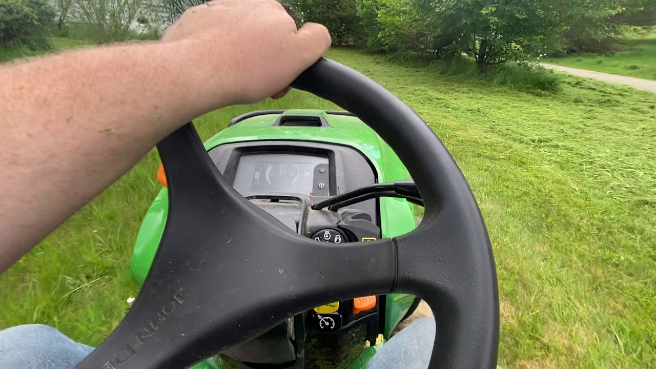 John Deere x758 mows overgrown yard down