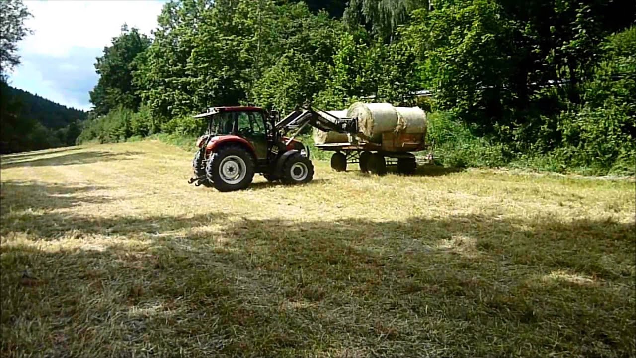 Heuernte 2014 Rundballen Fahren mit Case Farmall 75 C