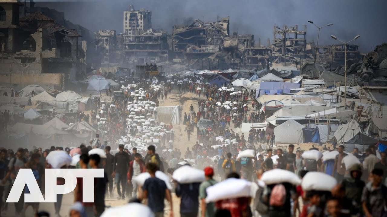 Israel Opens Channel: Palestinians in Gaza Rush to Receive Aid | APT