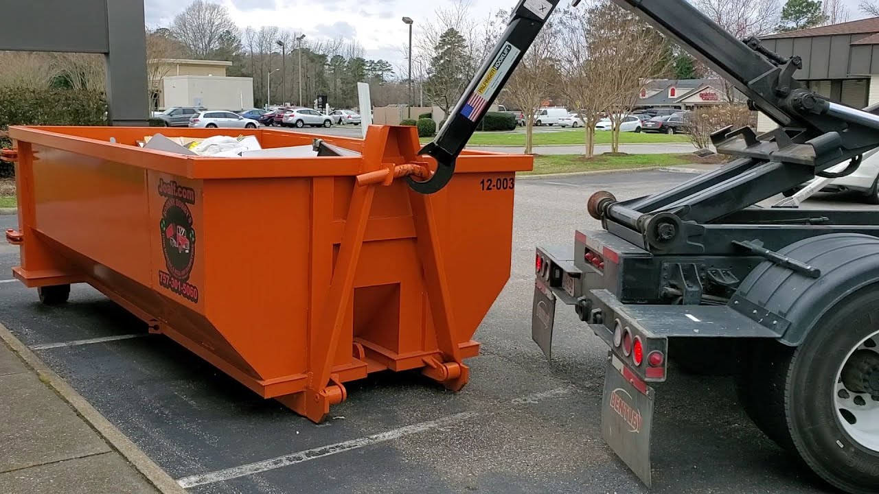 Isuzu FTR Hooklift Insane Dumpster Pick-up Angle