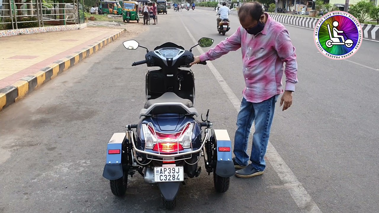 HONDA ACTIVA 125CC 3 WHEELER FOR HANDICAPPED MODIFIED BY BAJEEAND SONS MOBILITY  PH 98484-58025