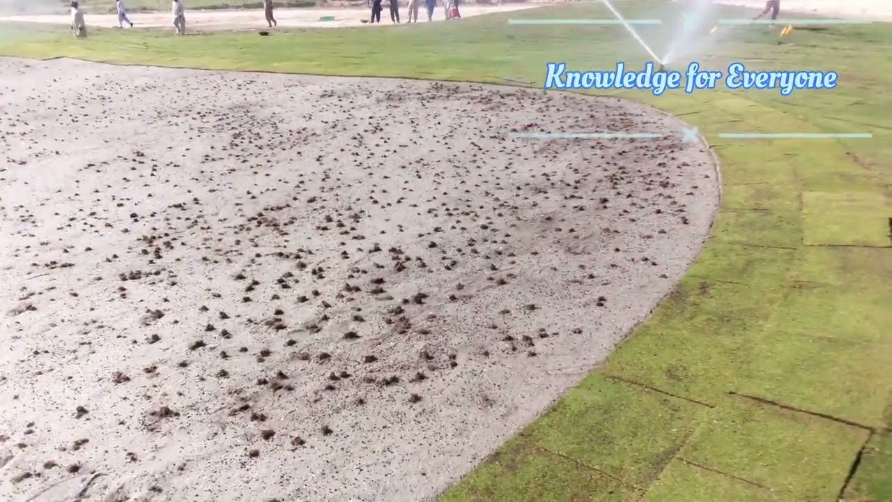 Green construction, contouring and fertilizer application. Golf course construction