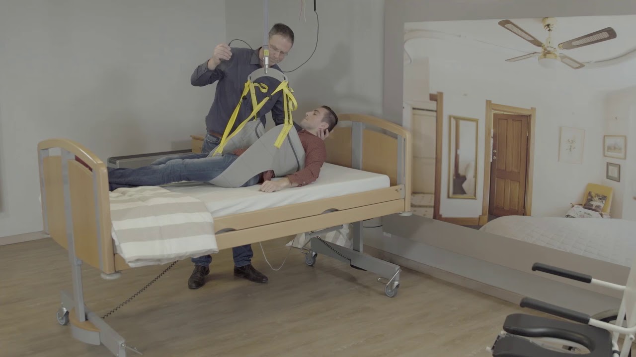 Handi-Move : using the toilet-hygiene sling - on a bed