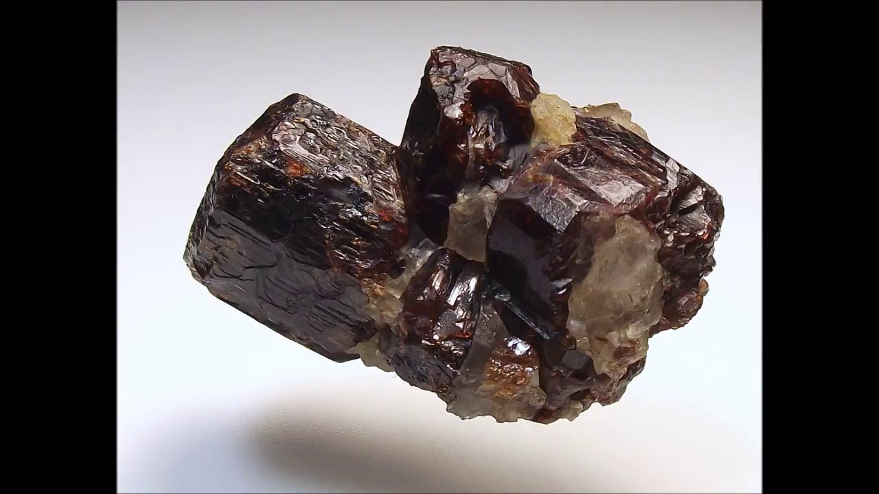 Collecting vesuvianite crystals, blue calcite, etc., in a skarn zone in Qu&eacute;bec, Canada