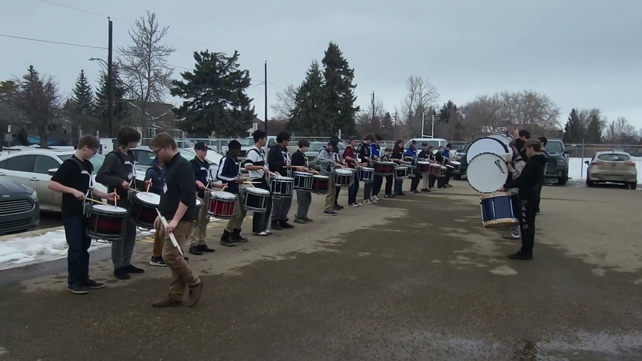 Drum practice in parking lot Alberta Youth Pipe Band Day Red Deer 9