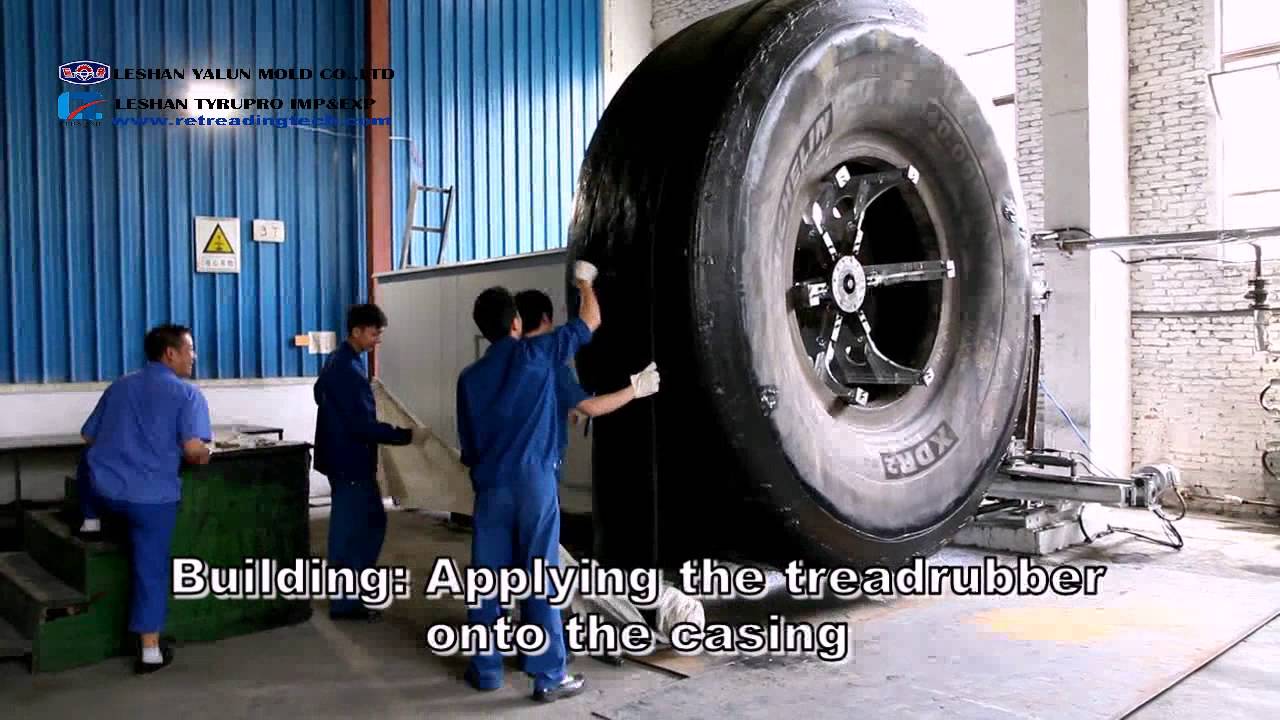 Giant OTR tire building machine for retreading