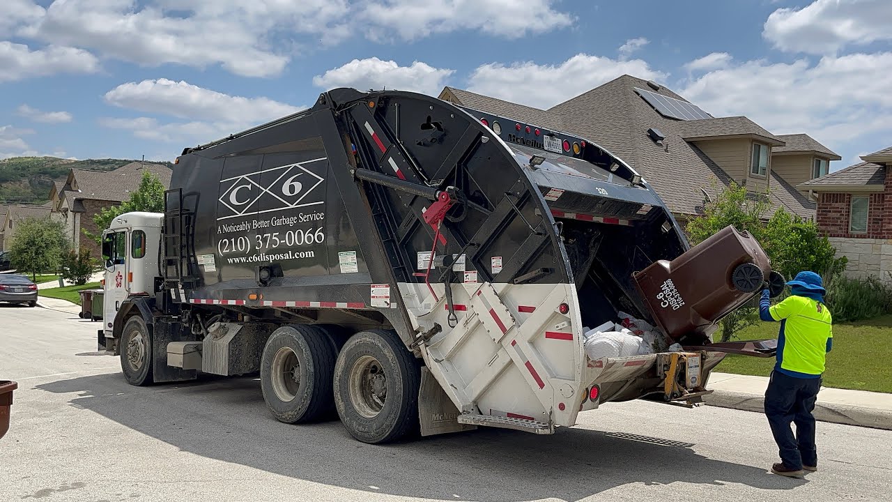 Ex-C6 Disposal: Peterbilt 520 McNeilus Rear Loader Garbage Truck