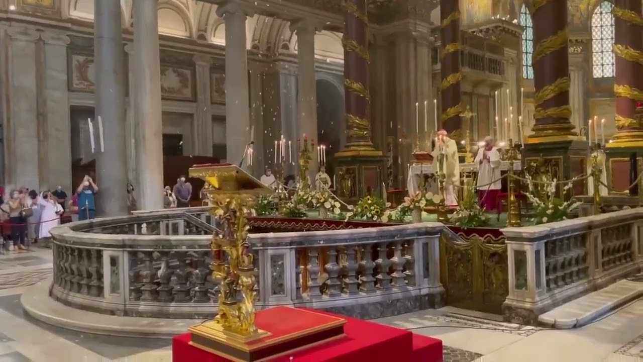 White rose petals descend from the ceiling during a Solemn Mass at Rome&rsquo;s Basilica of St. Mary Major