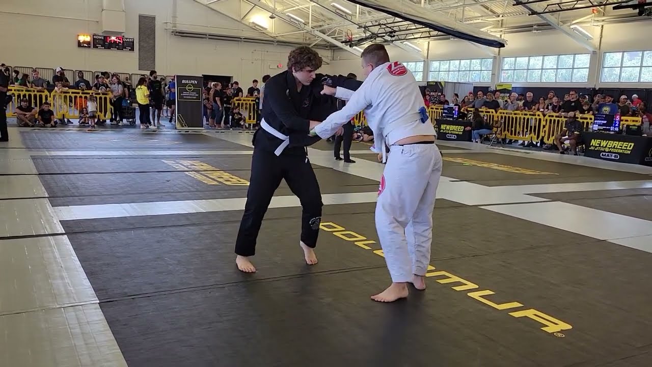 BJJ White Belts Seek To Understand The Deeper Questions Of Life In Match At BJJ Competiton