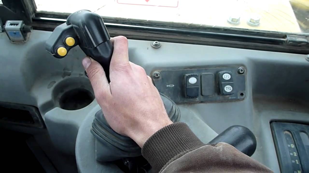 Как работают органы управления Caterpillar 657G