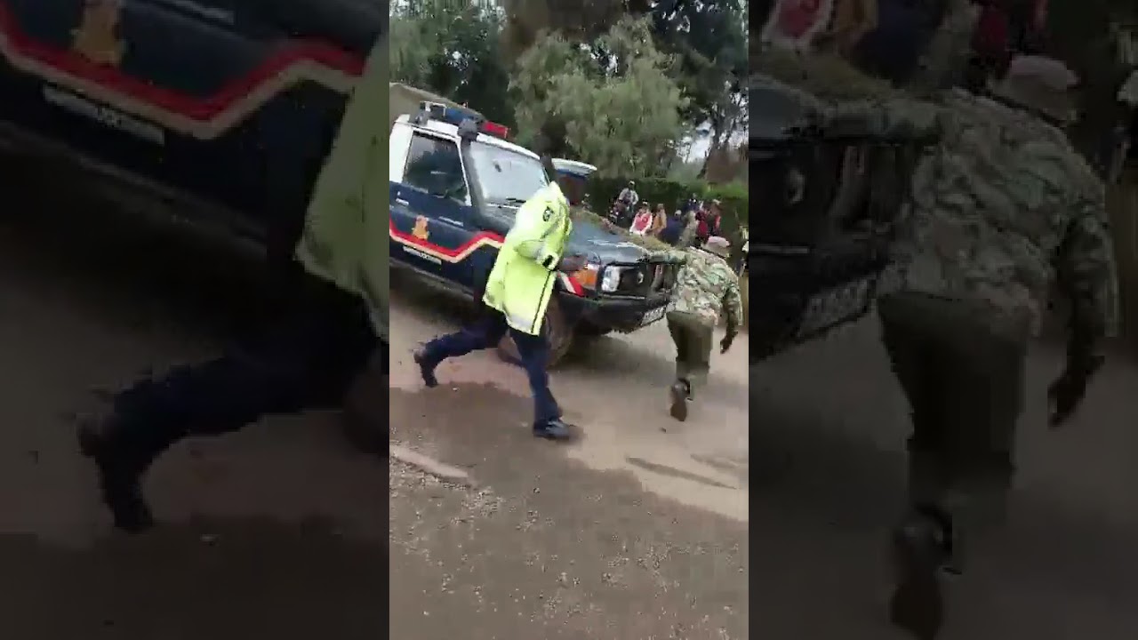 DRAMA AS A MAN DESTROY A POLICE CAR AS POLICE WATCH! AND LATER ARRESTED! KENYANS WAMECHOKA!!!
