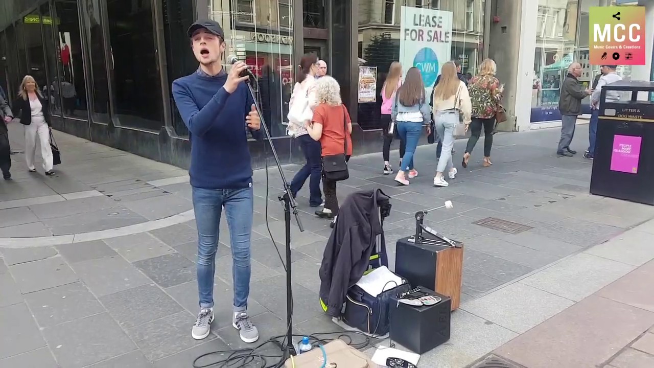Amazing young busker singing 