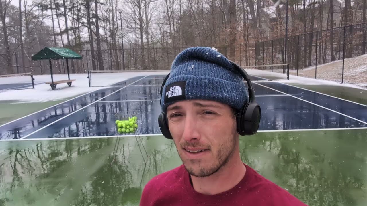 Practicing with the two-handled racquet
