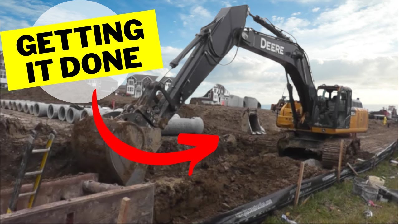 Deere 350G Excavator Digging Out A Deep Ditch