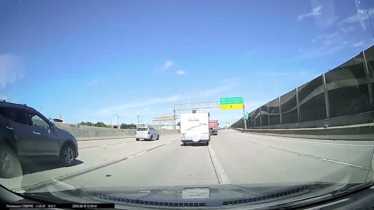 SUV nearly merges into me