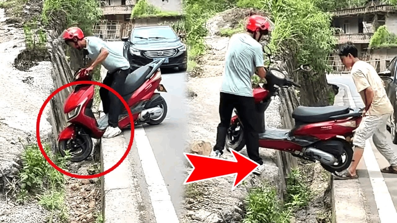 A young man's motorcycle got stuck in a ditch, and kind people helped lift it out.