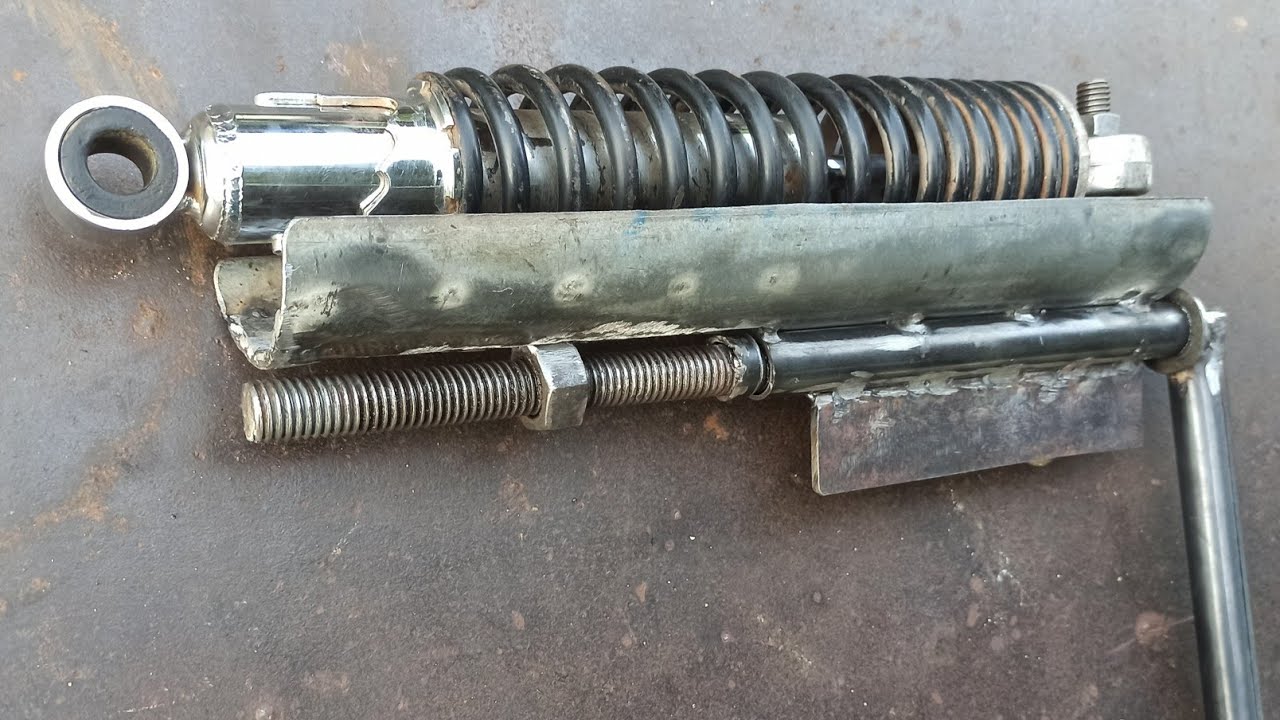 anda perlu melihat ide ini!! cara membuat alat  treker shock belakang motor