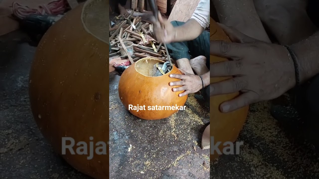 Attaching the wooden neck to the Sitar's pumpkin made by Rajat Satarmekar no 9730311044