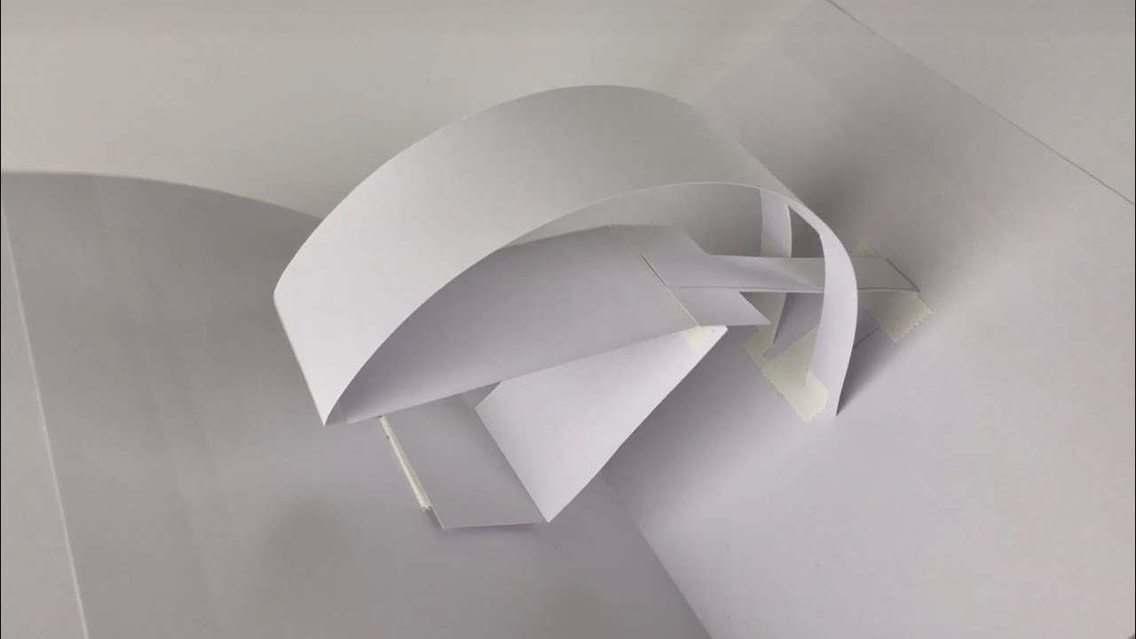 Curved bridge over the centerfold pop-up mechanism (experiment)