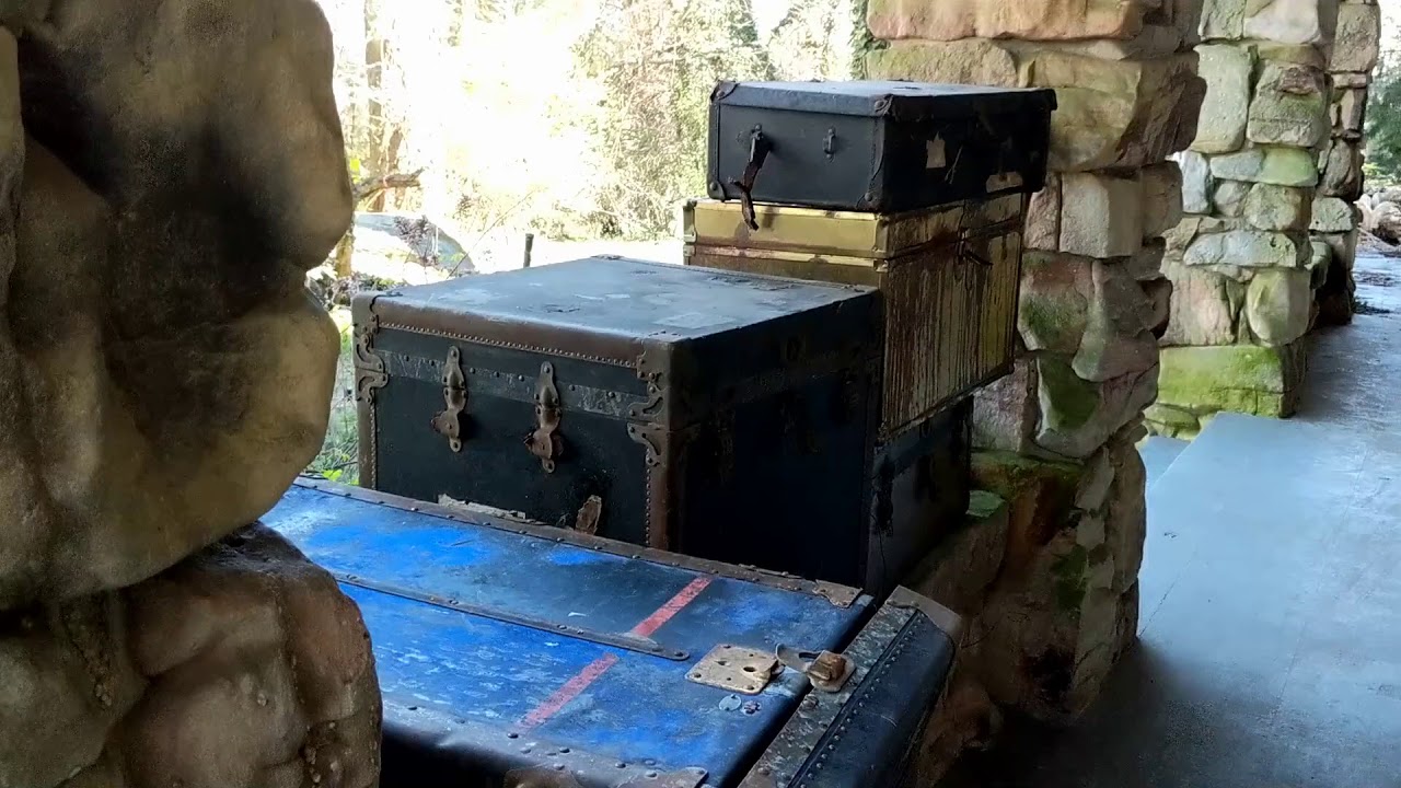 Abandoned 103 year old Mansion with luggage on the porch Chattanooga TN
