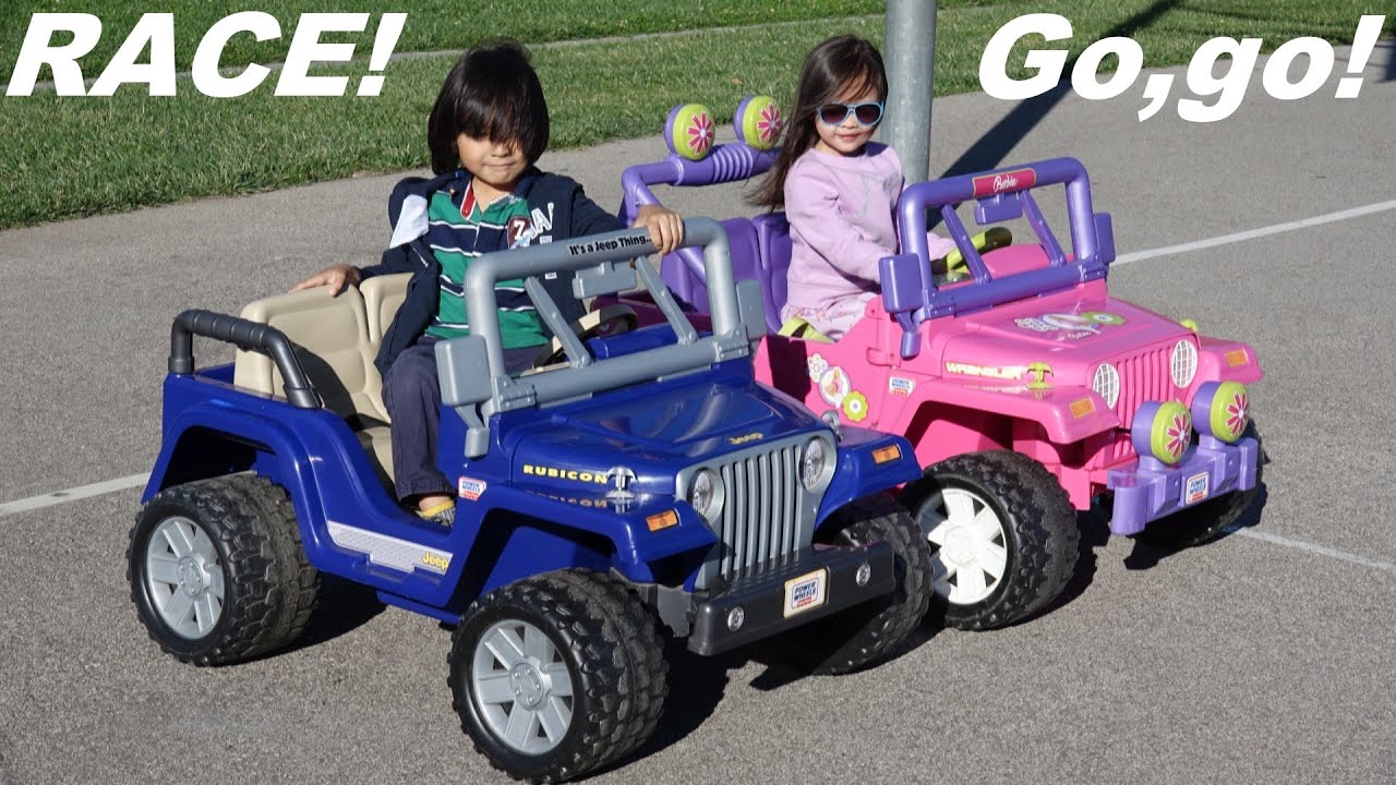 Ride-On Power Wheels Racing! Blue Jeep Wrangler VS Pink Barbie Jeep Wrangler