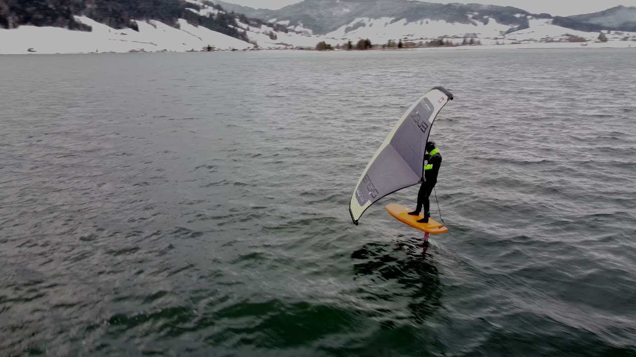 Wing foiling in the snow, Agerisee, Switzerland