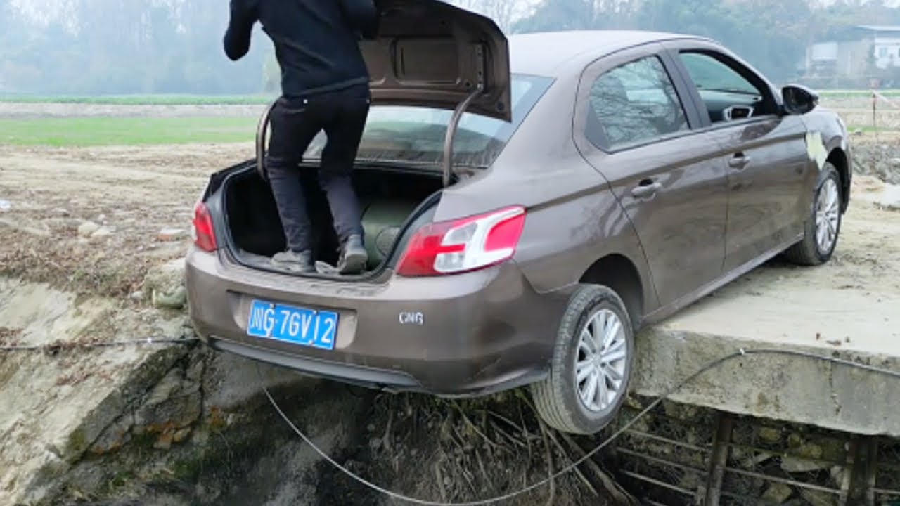 How To Save Yourself If Your Car Falls Into A Puddle While Reversing.