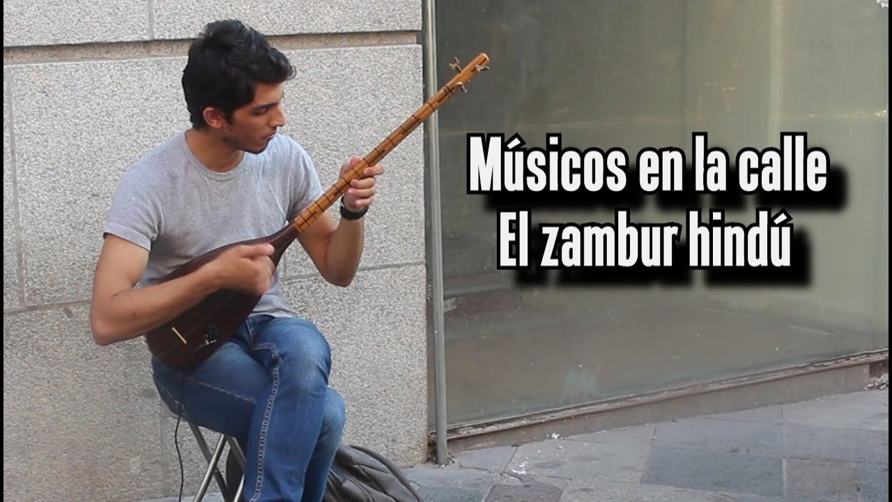 Músico HINDÚ tocando el ZAMBUR en MADRID