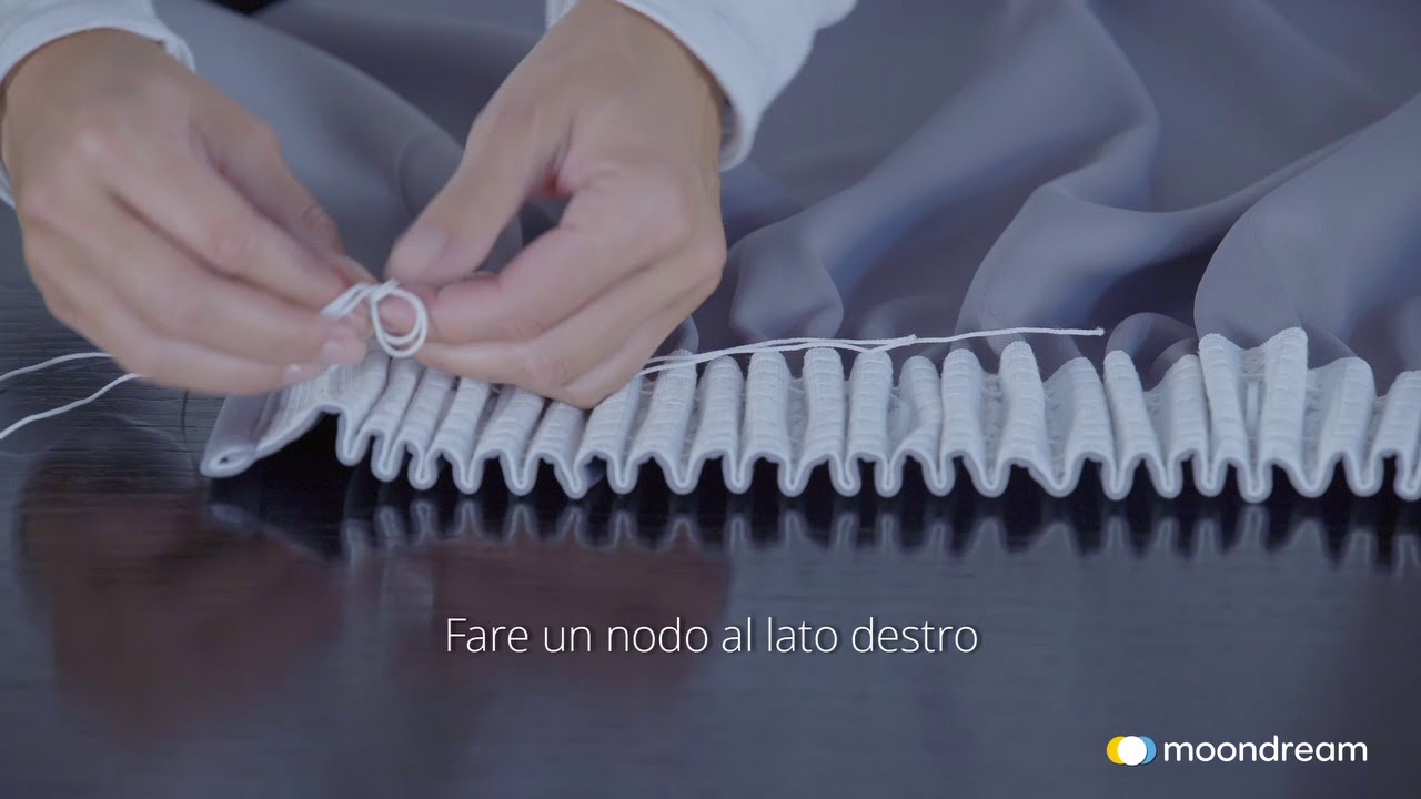 Come appendere una tenda Moondream con fettuccia arricciatenda ?
